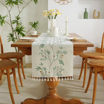Chemin de table en lin et coton brodé avec pampilles - Vignette | setdetable
