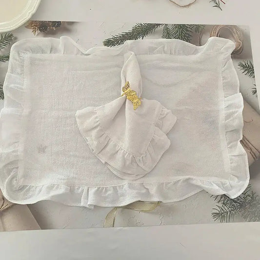 Sets de table serviettes blanches volants